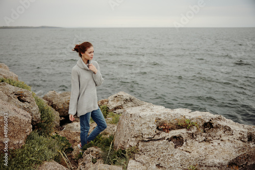 pretty woman freedom walk on the stone coast Lifestyle © SHOTPRIME STUDIO
