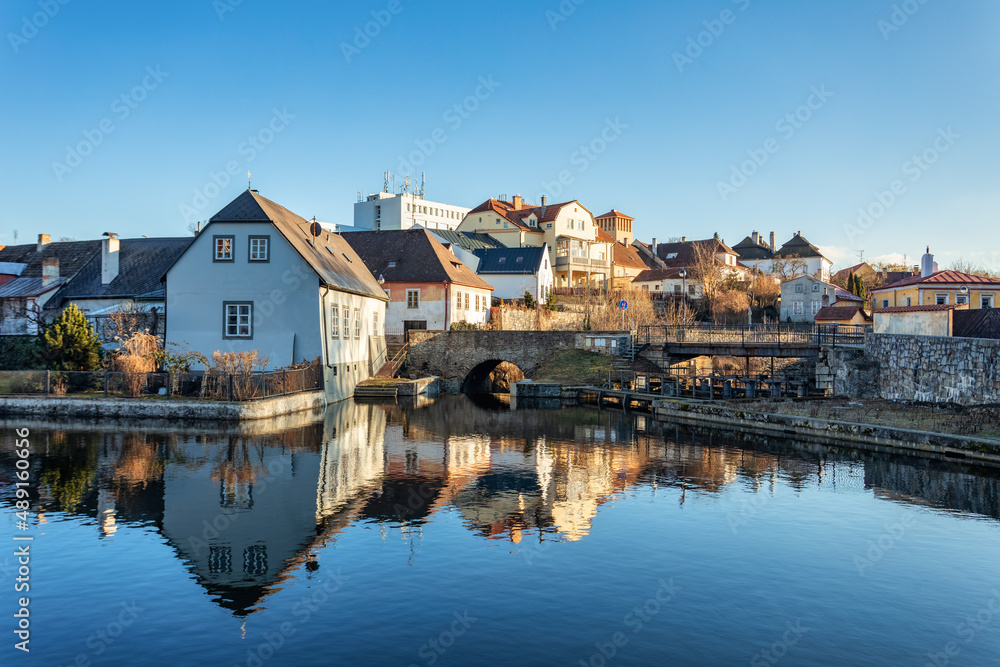Old town in city Jindrichuv Hradec reflecting in water, Czech Republic in the region South Bohemia.