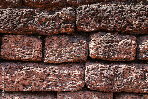 Colorful natural stone wall texture background.