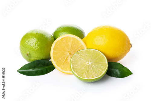 Lemons and limes with leaves isolated on white background