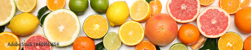 Obraz na plátně Different citrus fruits on white background, top view