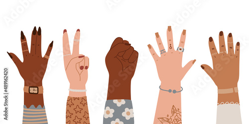 Women hands different nationalities. International Women's Day, 8 March greeting card, banner. Set of hands raised up. Group of diverse arms with rings, accessories, tattoo, manicure
