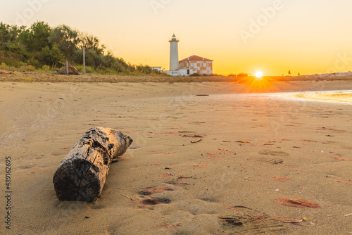 Sunrise in Bibione captured at a lighthouse in Italy. Bibione is a seaside resort in Italy in the region of Veneto, in the province of Venice photo
