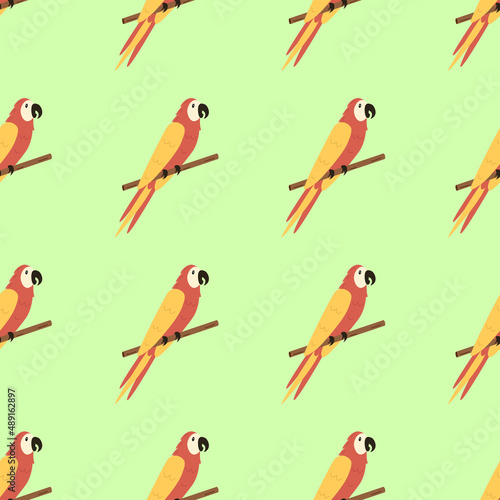 Seamless pattern cute cartoon macaw parrot is sitting on a branch. Background, wallpaper for printing on clothing packaging.