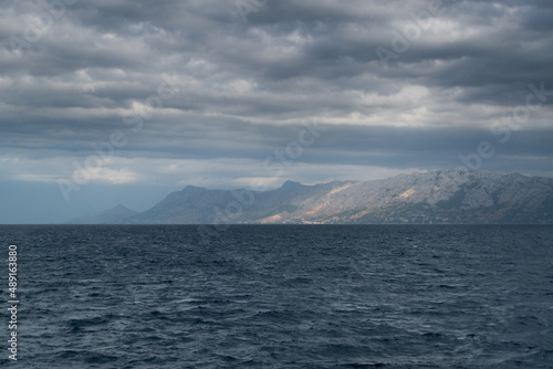Mountain coast and Adriatic Sea in Croatia during a cloudy day