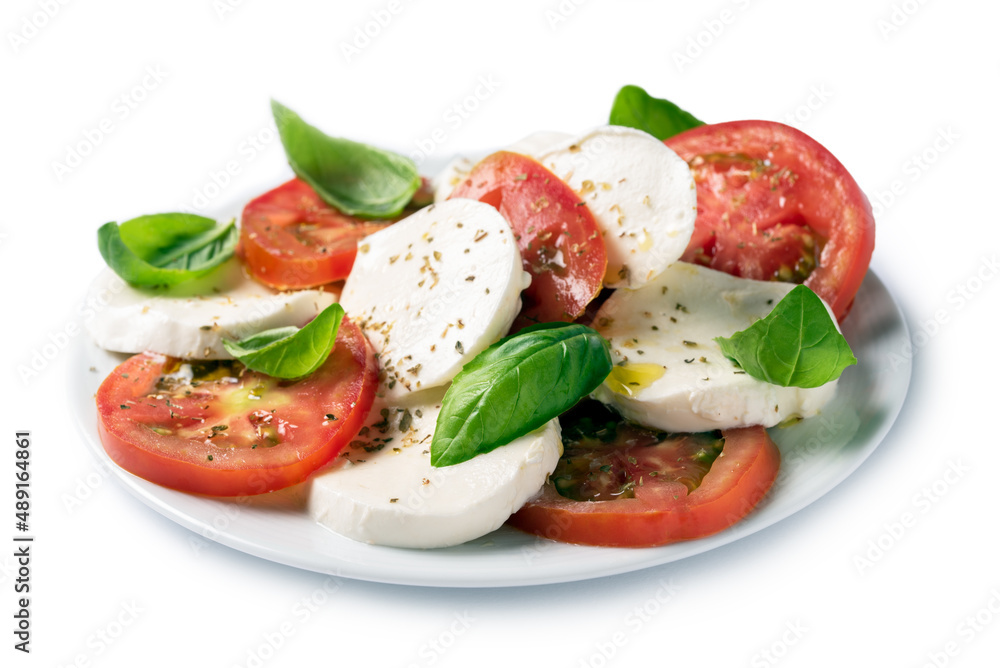 Piatto di insalata caprese fresca con mozzarella, pomodoro, olio di oliva, origano e basilico, cibo Italiano 