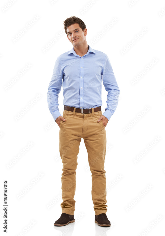 With the confidence to pull it off. Portrait of a handsome young man standing in a studio with his hands in his pockets. With the confidence to pull it off. Portrait of a handsome young man standing in a studio with his hands in his pockets.