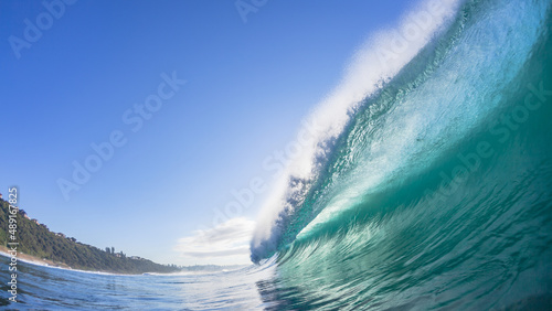 Fototapeta Naklejka Na Ścianę i Meble -  Ocean Wave Swimming Close-Up Crashing Hollow Tube Natures Power.