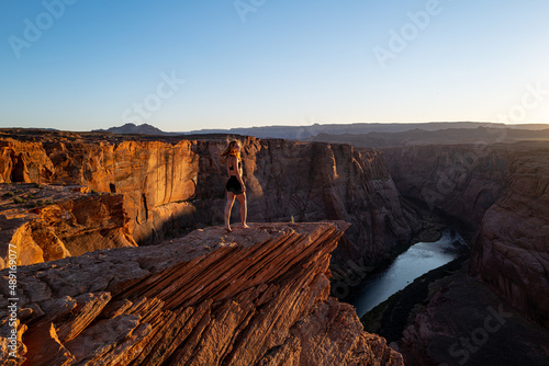 Carefree woman on Grand canyon. Woman enjoying view of Horseshoe bend, Arizona.