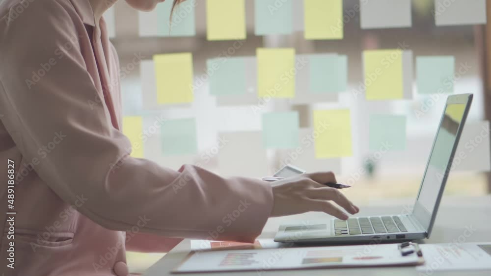 a young woman working with a laptop in a coffee shop business idea financial girl accountant a young woman working with a laptop in a coffee shop business idea financial girl accountant