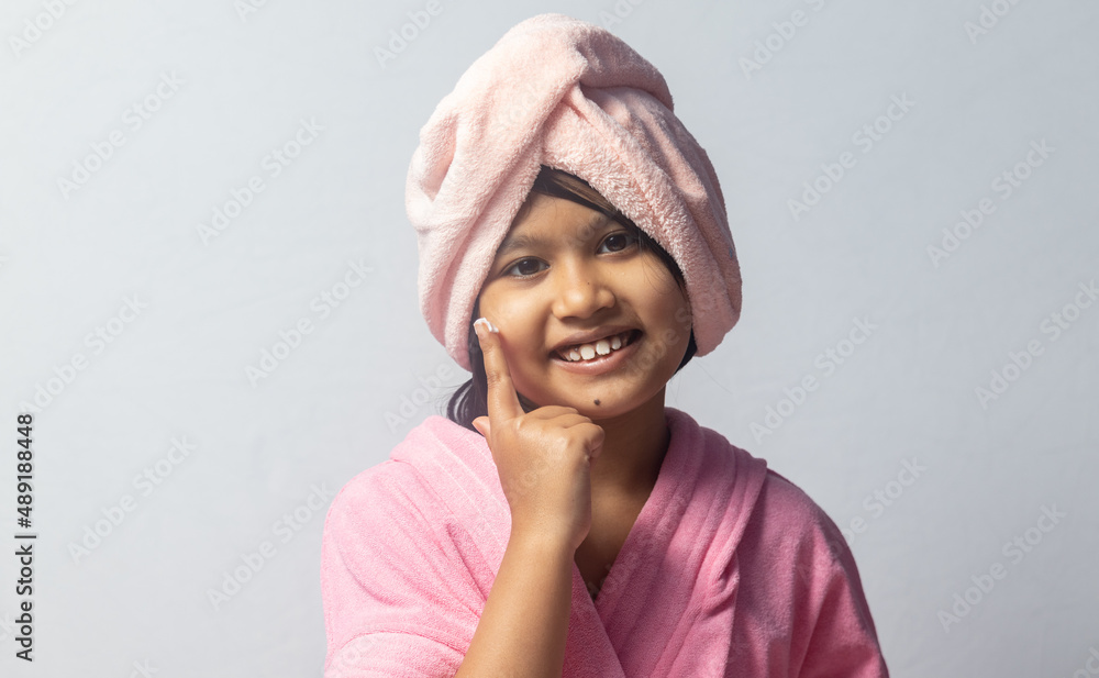 Girl child in pink bathrobe Girl child in pink bathrobe