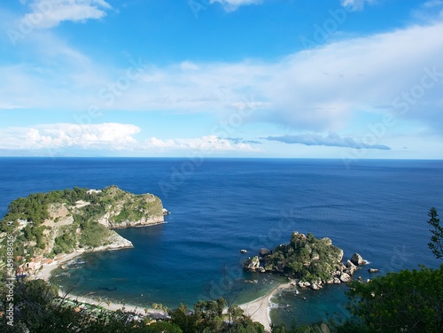picturesque view of the Ionian Sea coast from the town of Taormina located on a hill in Sicily