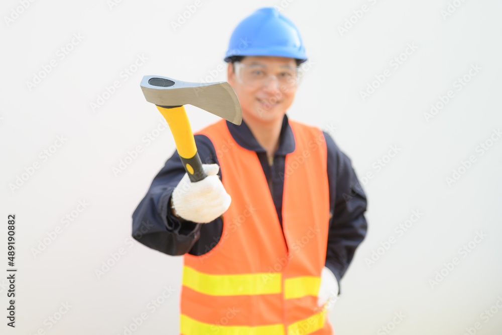 Man hold steel ax tools on white background.