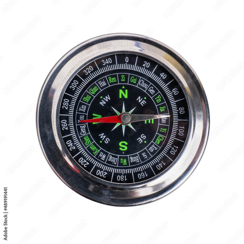Hand holding a compass ready for a holiday adventure travel it shows direction north south east west in white background. Hand holding a compass ready for a holiday adventure travel it shows direction north south east west in white background.