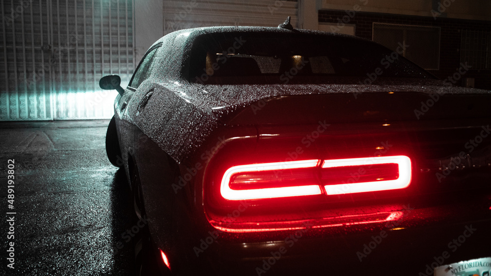 Car in rainy night