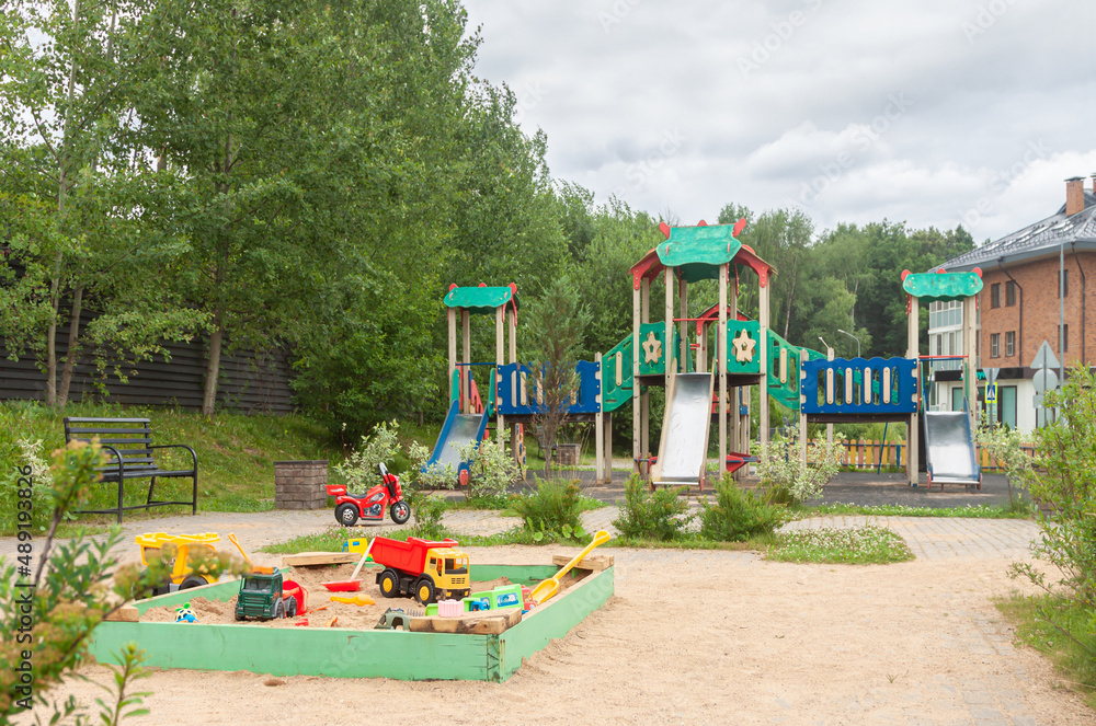 Children playground in the park green environment background. Sustainable lifestyle concept.