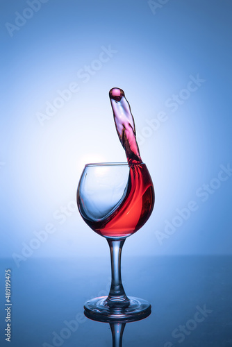 Levitation of rose wine over a glass
