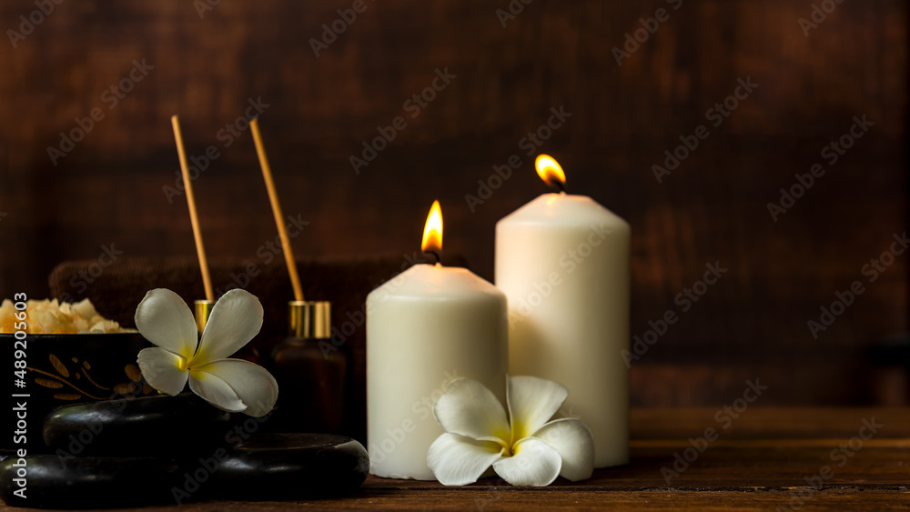 Thai spa massage.  Spa treatment cosmetic beauty. Therapy aromatherapy for care body women with candles for relax wellness. Aroma and salt scrub setting ready healthy lifestyle