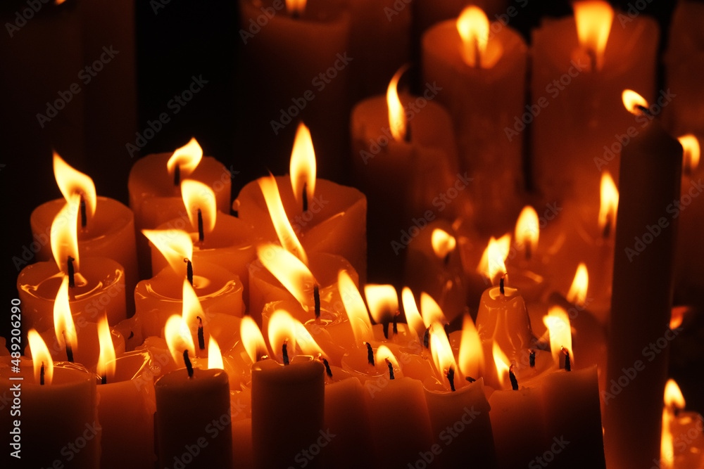 Lighting candles in chapel of Our Lady from the Kamenita vrata (Stone