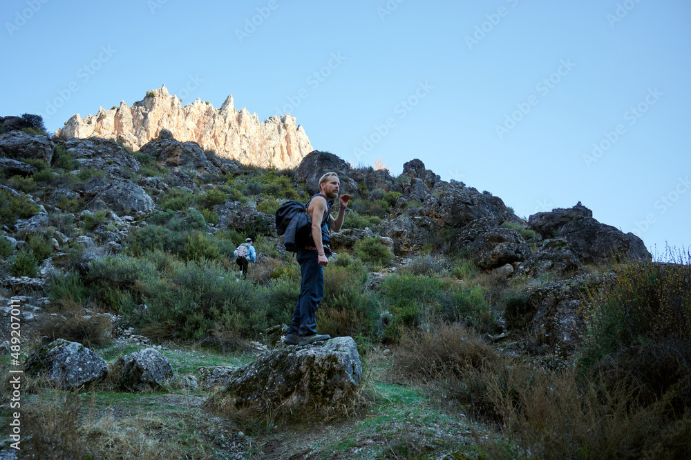 A hiker in the mediterranean mountains in Spain