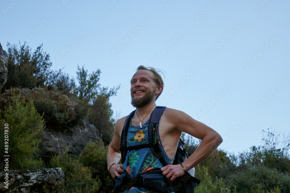 A hiker in the mediterranean mountains in Spain