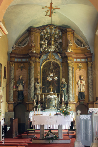 High altar in the church of Saint John the Baptist in Gornja Jelenska, Croatia photo