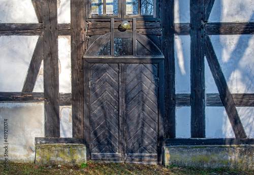 Tableau sur toile General view and close-up of architectural details of the post-Evangelical, now Catholic, historic church of Christ the King built in 1734 in the town of Jerutki in Masuria, Poland