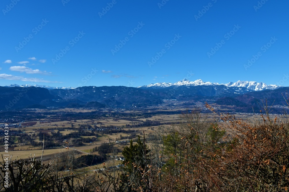 Panoramic view of Gorenjska, Slovenia with mountain Triglav in Julian alps and Jelovica plateau