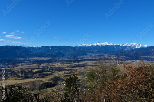 Panoramic view of Gorenjska  Slovenia with mountain Triglav in Julian alps and Jelovica plateau