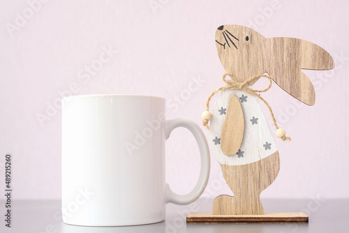 Photography White coffee mug easter mockup with bunny and easter eggs on white background