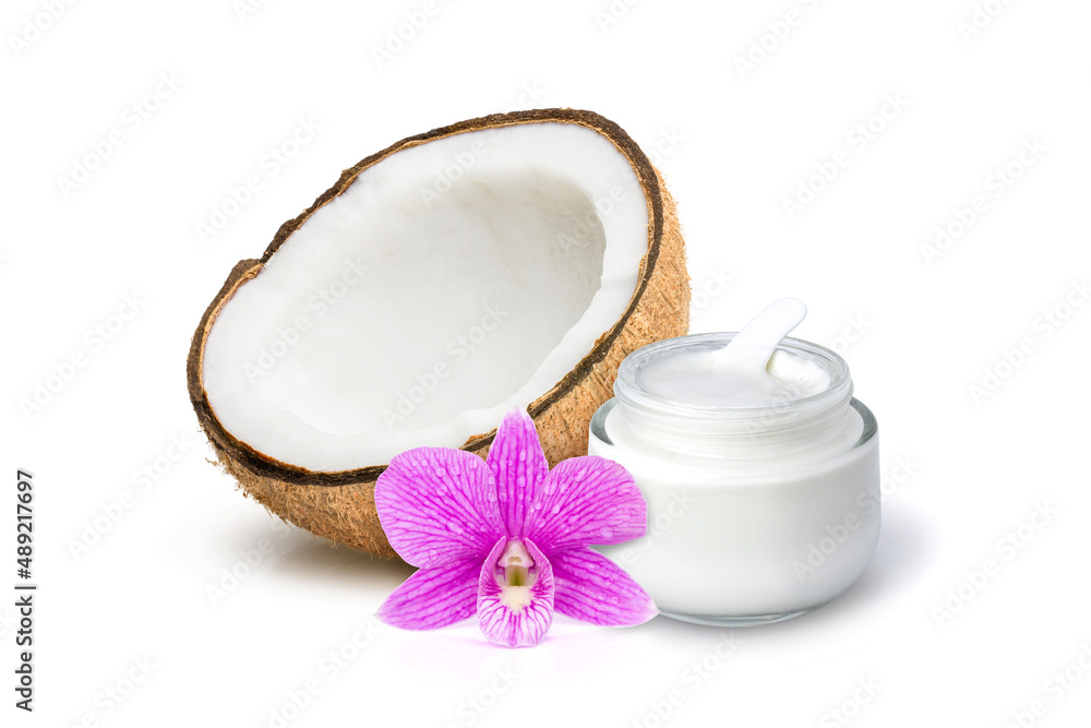 Coconut cream in glass jar with fresh coconut fruit with orchid flower isolated on white background. Coconut cream in glass jar with fresh coconut fruit with orchid flower isolated on white background.