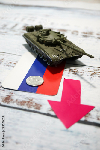 russian flag with toy tank and rouble coin crisis war conflict ukraine wallpaper