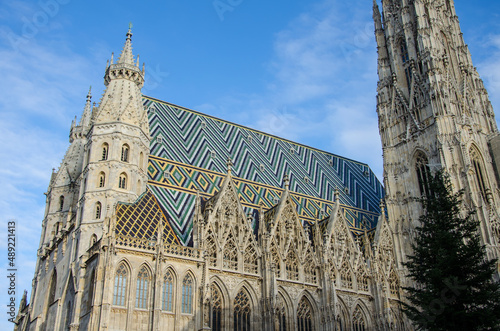Low angle view of St. Stephen's Cathedral, Vienna under the blue clear sky photo