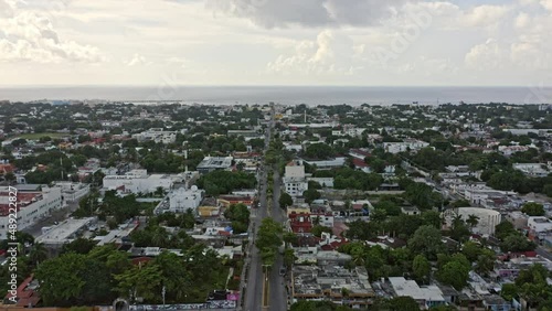 Cozumel Mexico Aerial v22 spectacular view drone flying above av lic bentito juarez capturing grid cityscape toward ferry terminal with endless caribbean sea and horizon at daytime - September 2020 photo