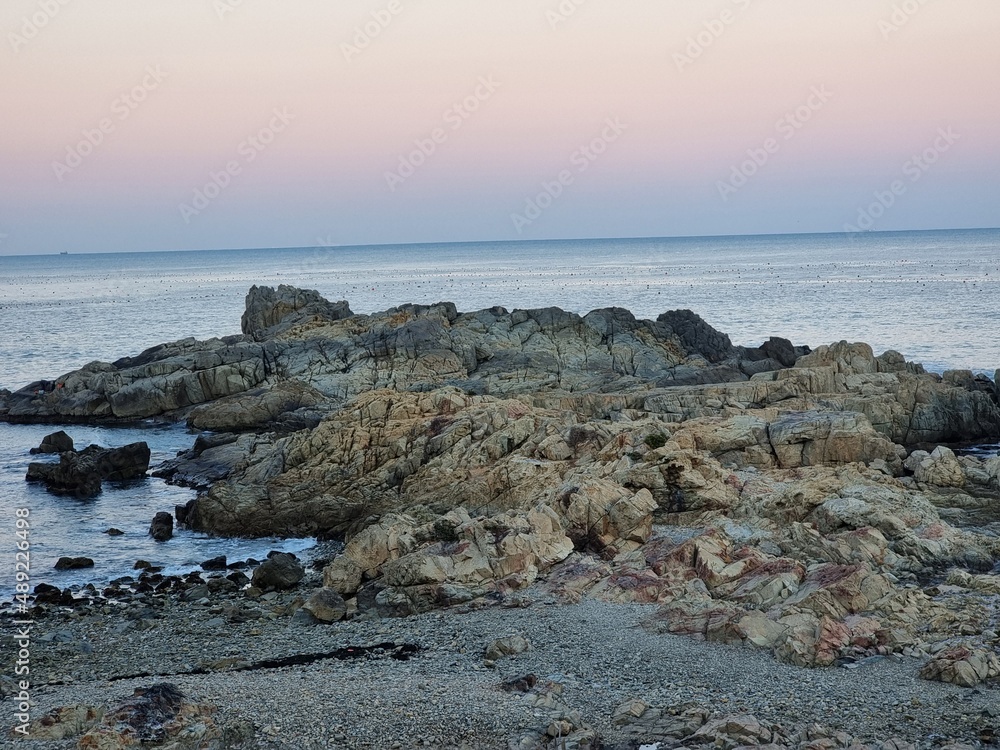This photo was taken from a rock on the beach. This photo was taken from a rock on the beach.