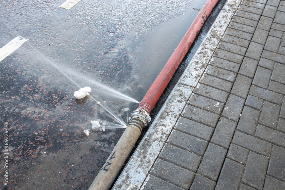 Expired Fire Hose , water leaking. water leaking from hole in a