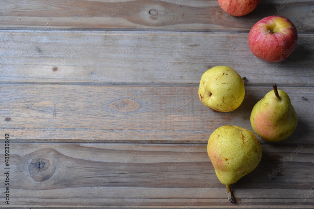 fresh apples and pears on wooden background fresh apples and pears on wooden background