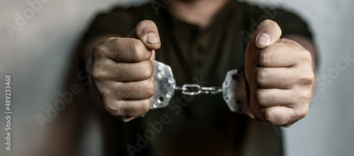 Tableau sur toile prisoner concept,Handcuffed hands of a prisoner in prison, Male prisoners were s