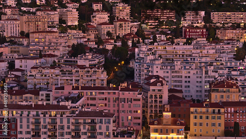 Beautiful aerial view over district Quartier du Port in the downtown of Nice, France at the French Riviera in the evening light after sunset.