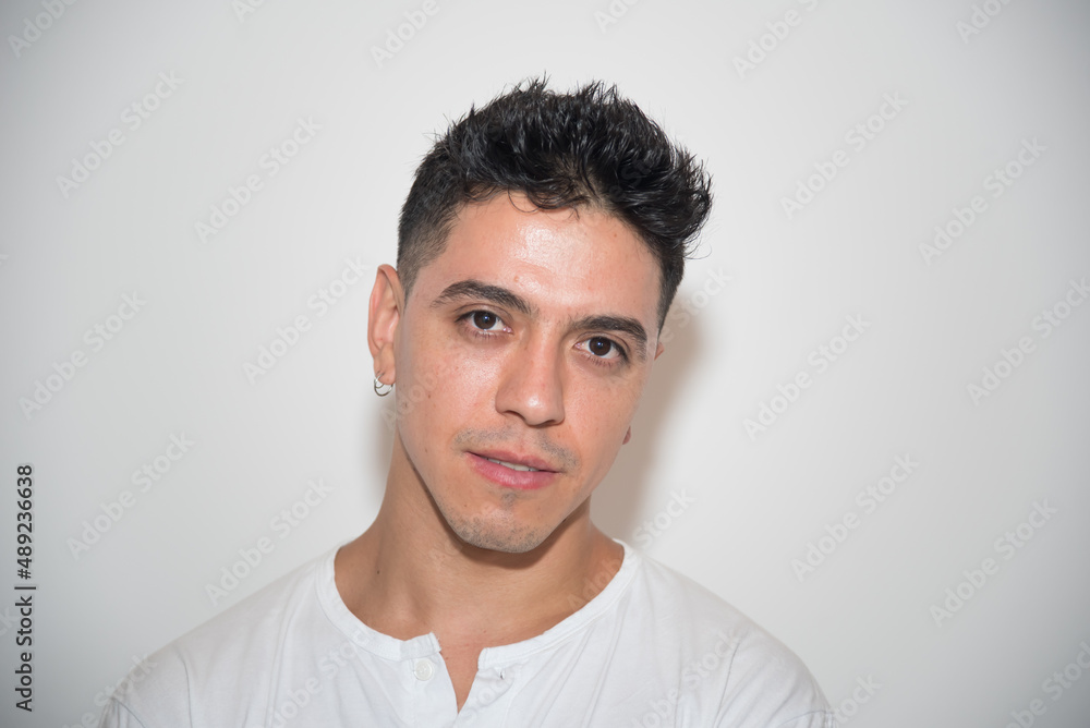 nice guy, dark-haired, white test, white t-shirt, looking straight ahead, neutral background nice guy, dark-haired, white test, white t-shirt, looking straight ahead, neutral background