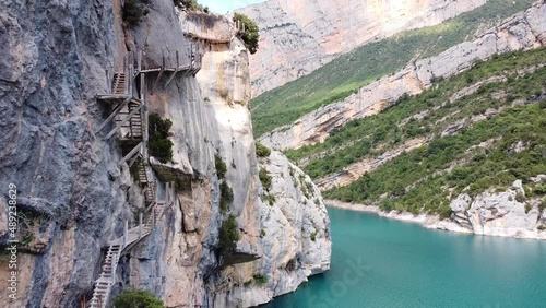Pasarelas de Montfalco at Congost de Mont Rebei Canyon, Catalonia and Aragon, North Spain - Aerial Drone View of the Dangerous Stairs and Hiking Trail along the Steep Cliffs photo