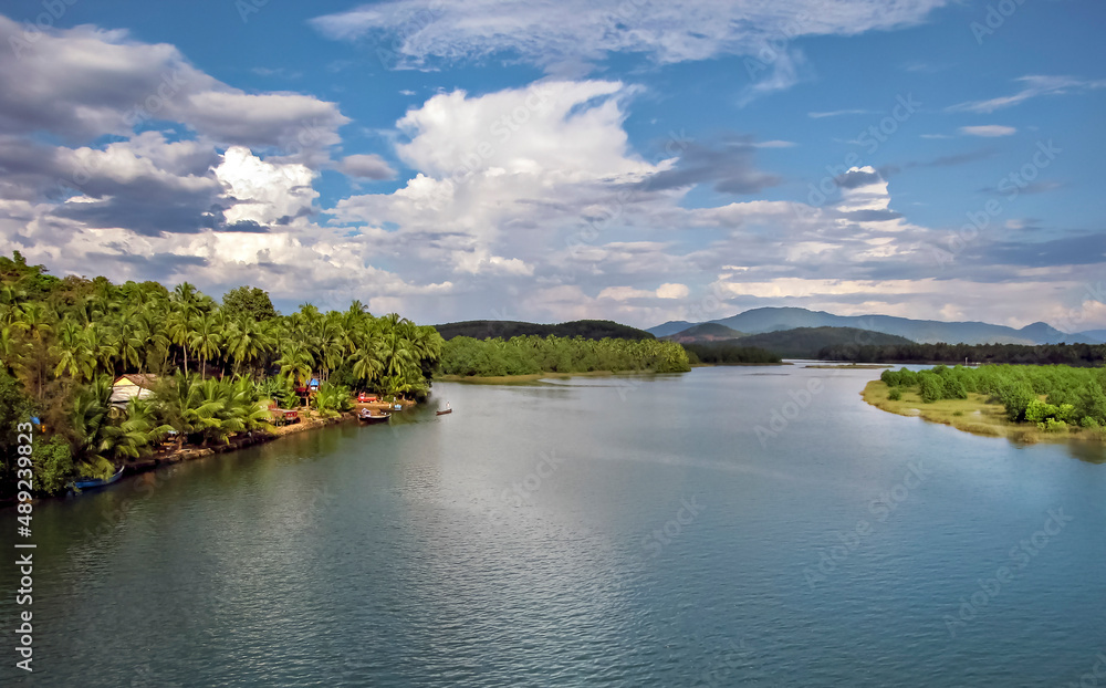 Magnificent view of the Sharavathi river with nice blue sky background in Honnavar, Karnataka, India