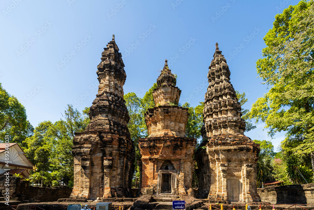 Fototapeta premium Sisaket, Thailand, December 16, 2021. Tourists visit Prasat Ban Prasat as architecture. Culture from Cambodia, Hinduism, made of sandstone and laterite of Thailand.
