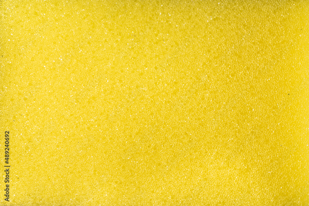Close up yellow sponge texture background Close up yellow sponge texture background