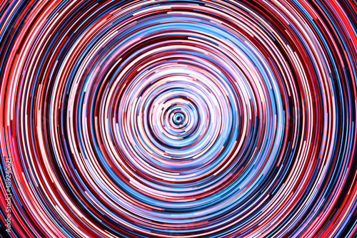 Neon circle lines with empty copy space inside isolated on black background. Colorful led lights long exposure rotation photo. Shiny light source. Cosmos space planet abstraction. Blue vortex spiral.