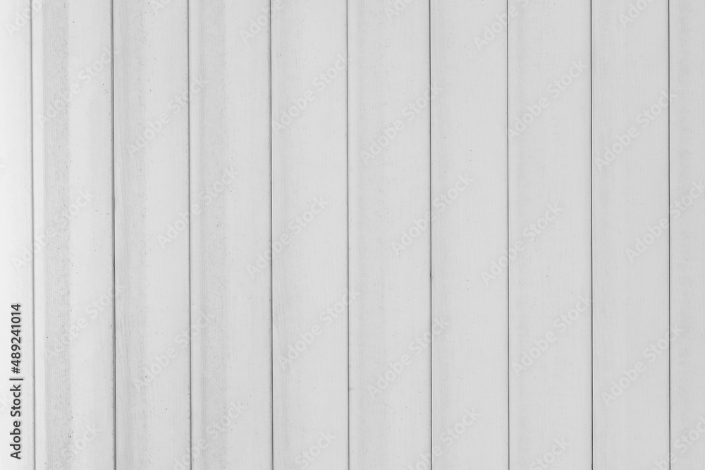 White vertical lines timber striped pattern fence boards wooden texture light background plank surface White vertical lines timber striped pattern fence boards wooden texture light background plank surface