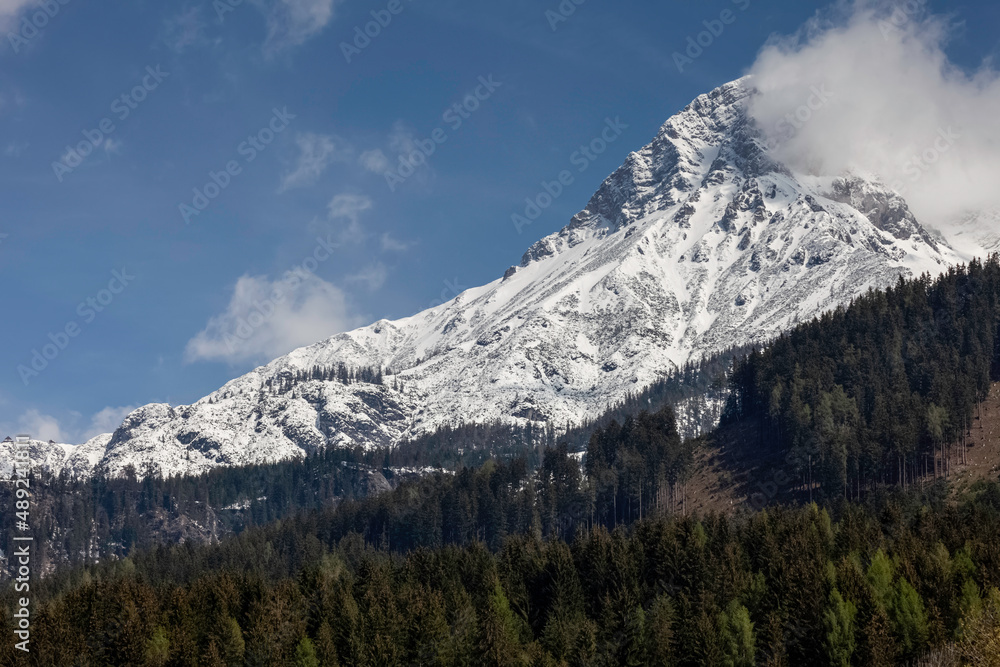 snow-covered mountains in the near of Saalfelden, a city in the region of Zell am See in Salzburg, Austria