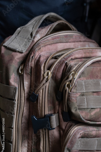 Camouflage backpack. Military equipment is special