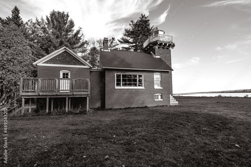 Sand Point Lighthouse in Baraga Michigan in black and white Sand Point Lighthouse in Baraga Michigan in black and white