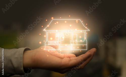 hand hold house graphic for loan mortage in investment business